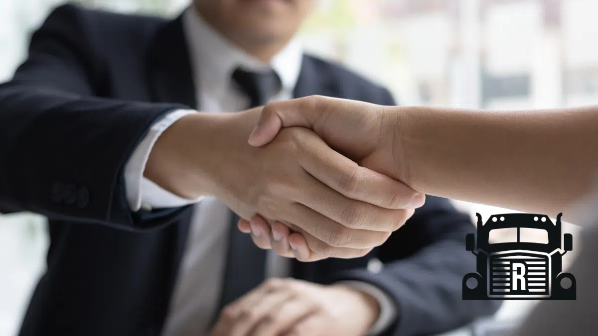 client shaking the hand of a lawyer
