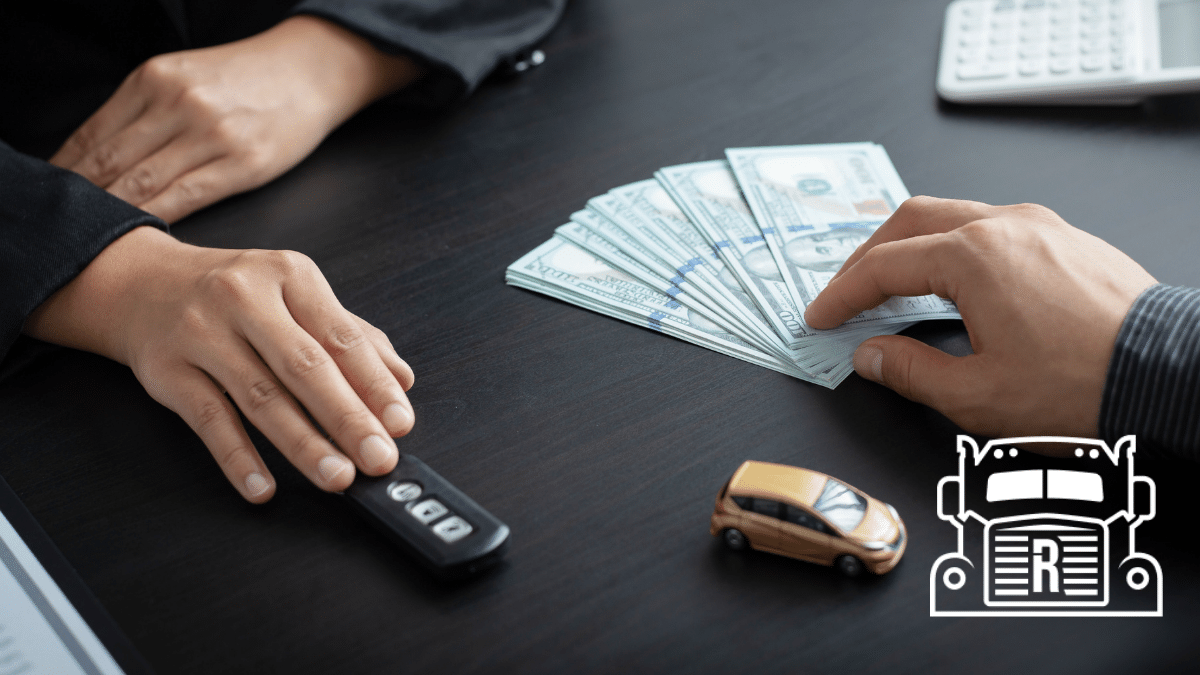 settlement money, key fob, and toy car on a desk