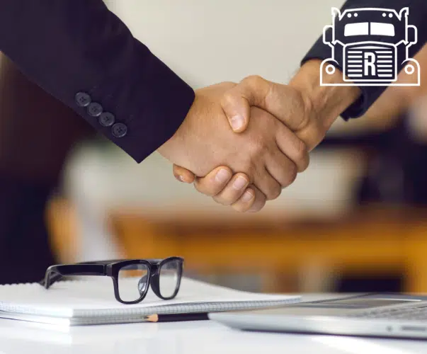 lawyer shaking the hand of a client