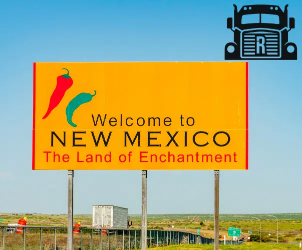 a sign reading "welcome to new mexico" and "the land of enchantment"