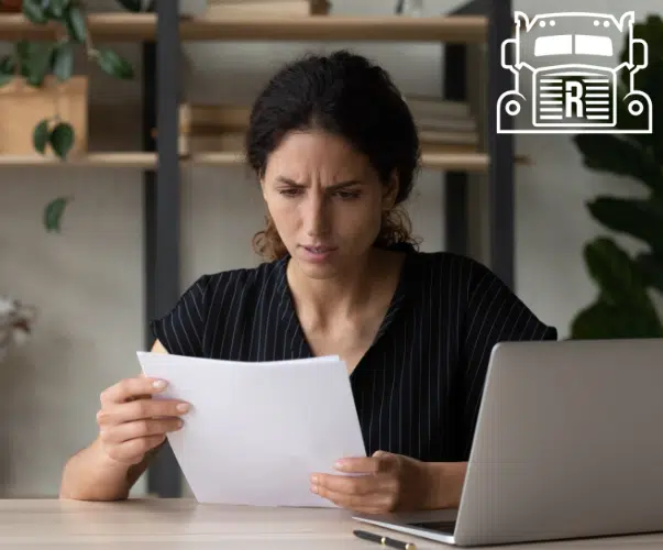 woman reading papers