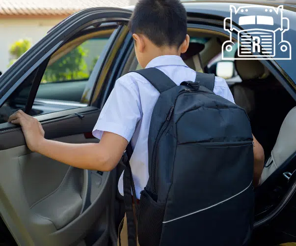 child getting into a car