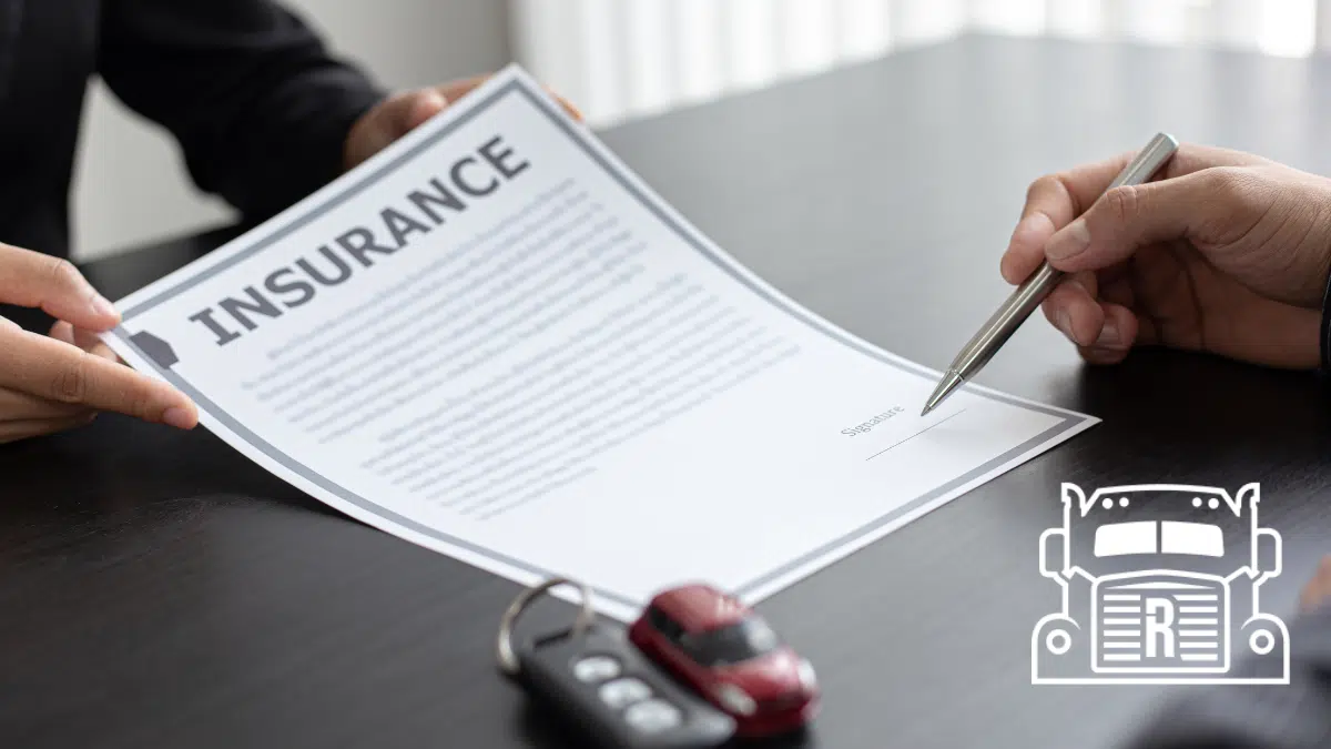 two people going over insurance paperwork