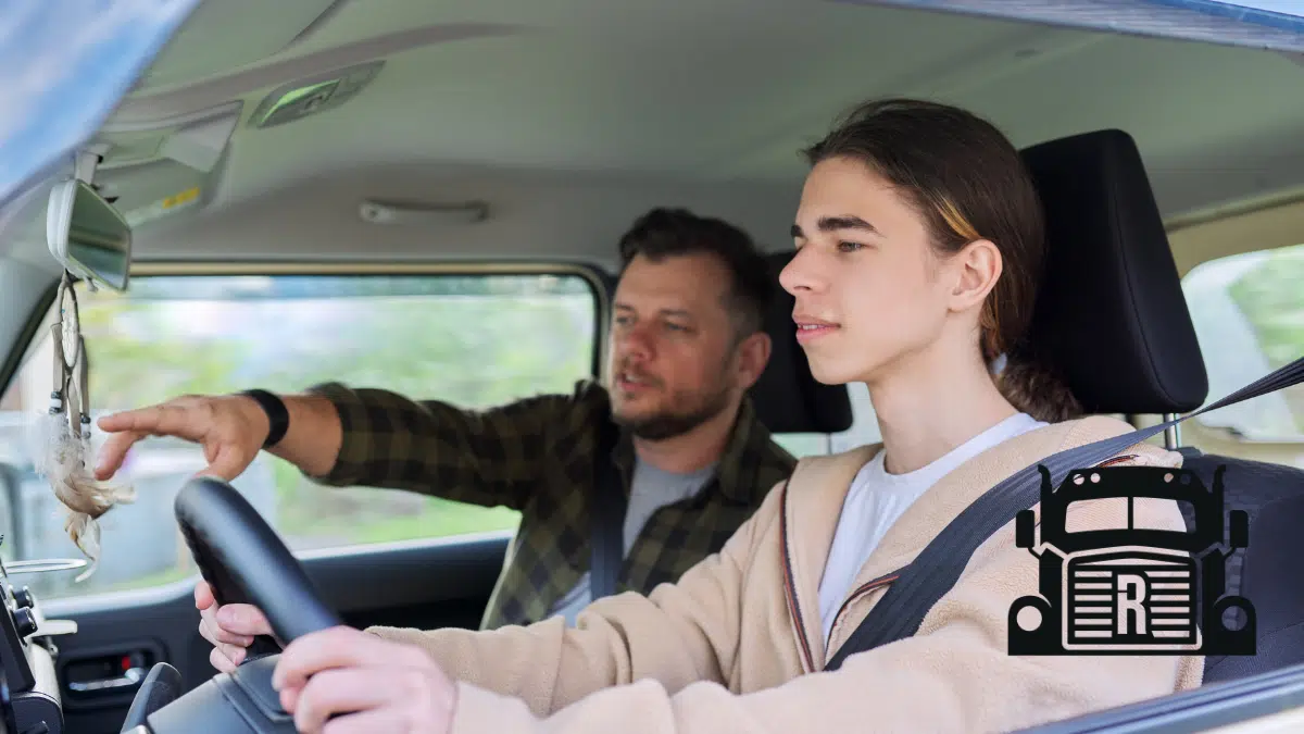 daughter driving with her father in the car