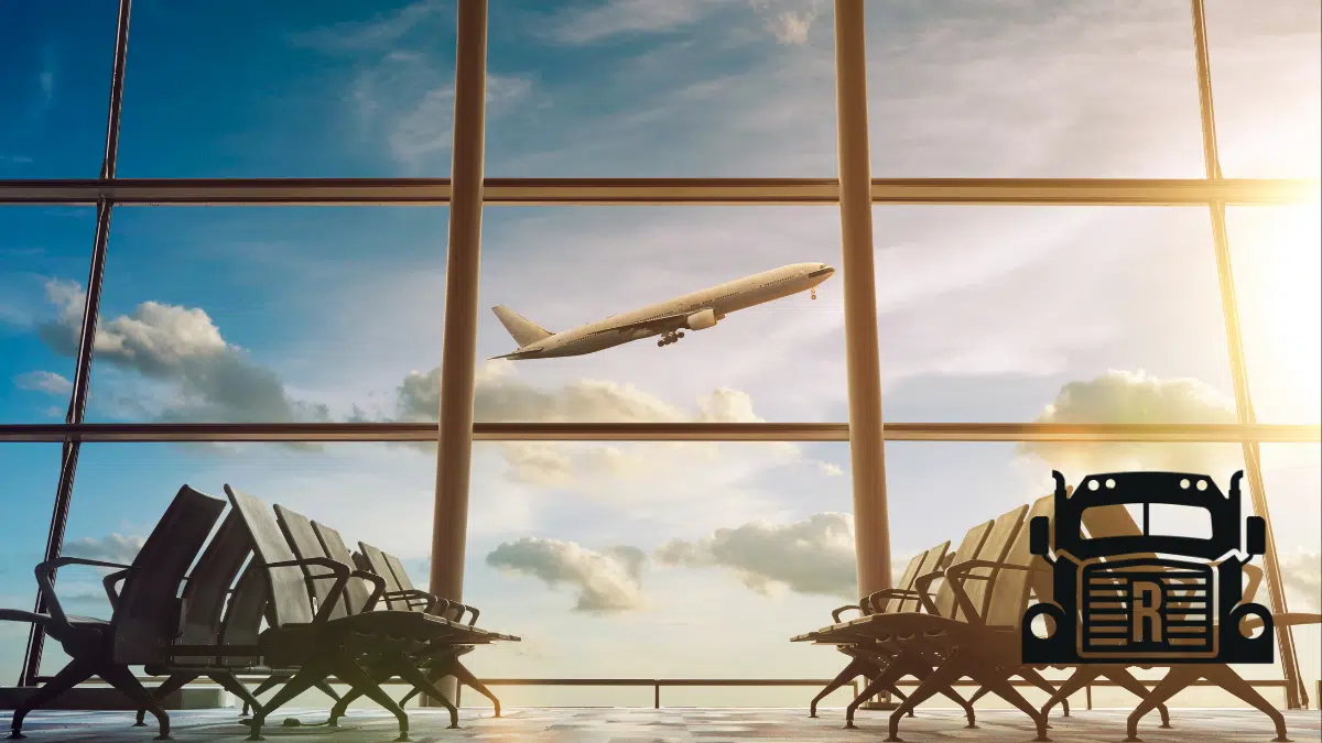 airport with view of a plane taking off