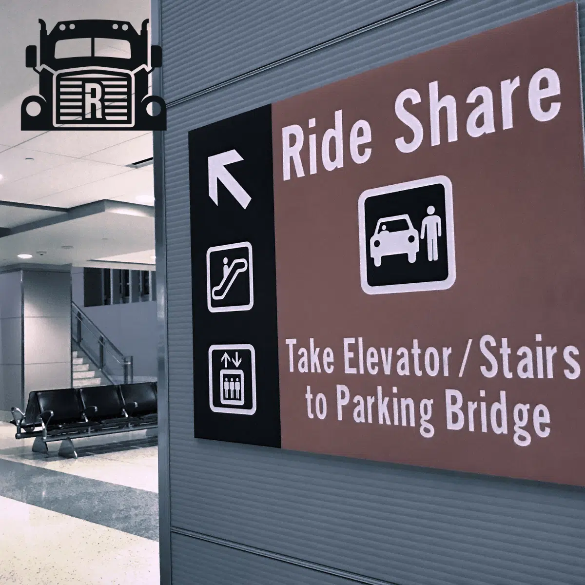 Sign pointing to where rideshares are located