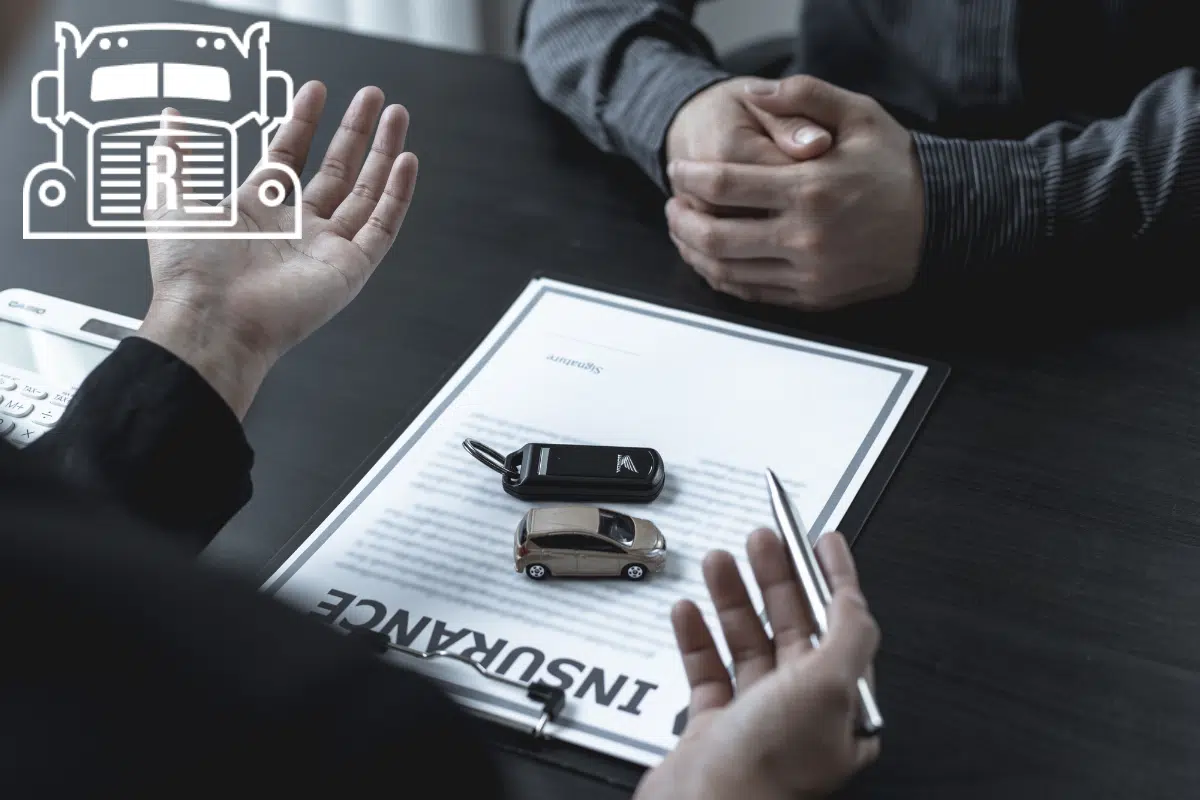 car accident lawyer discussing insurance paperwork